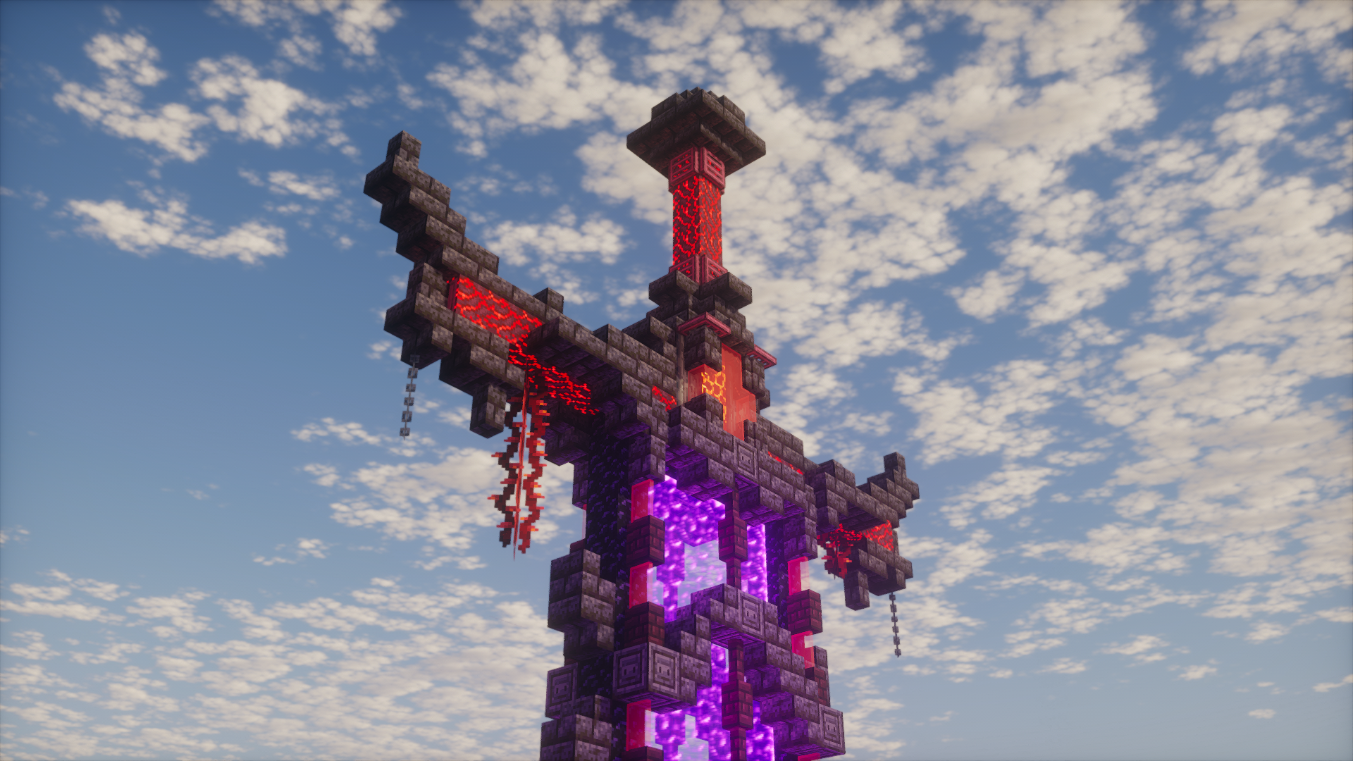 A towering crimson and purple nether portal beneath a cloudy sky