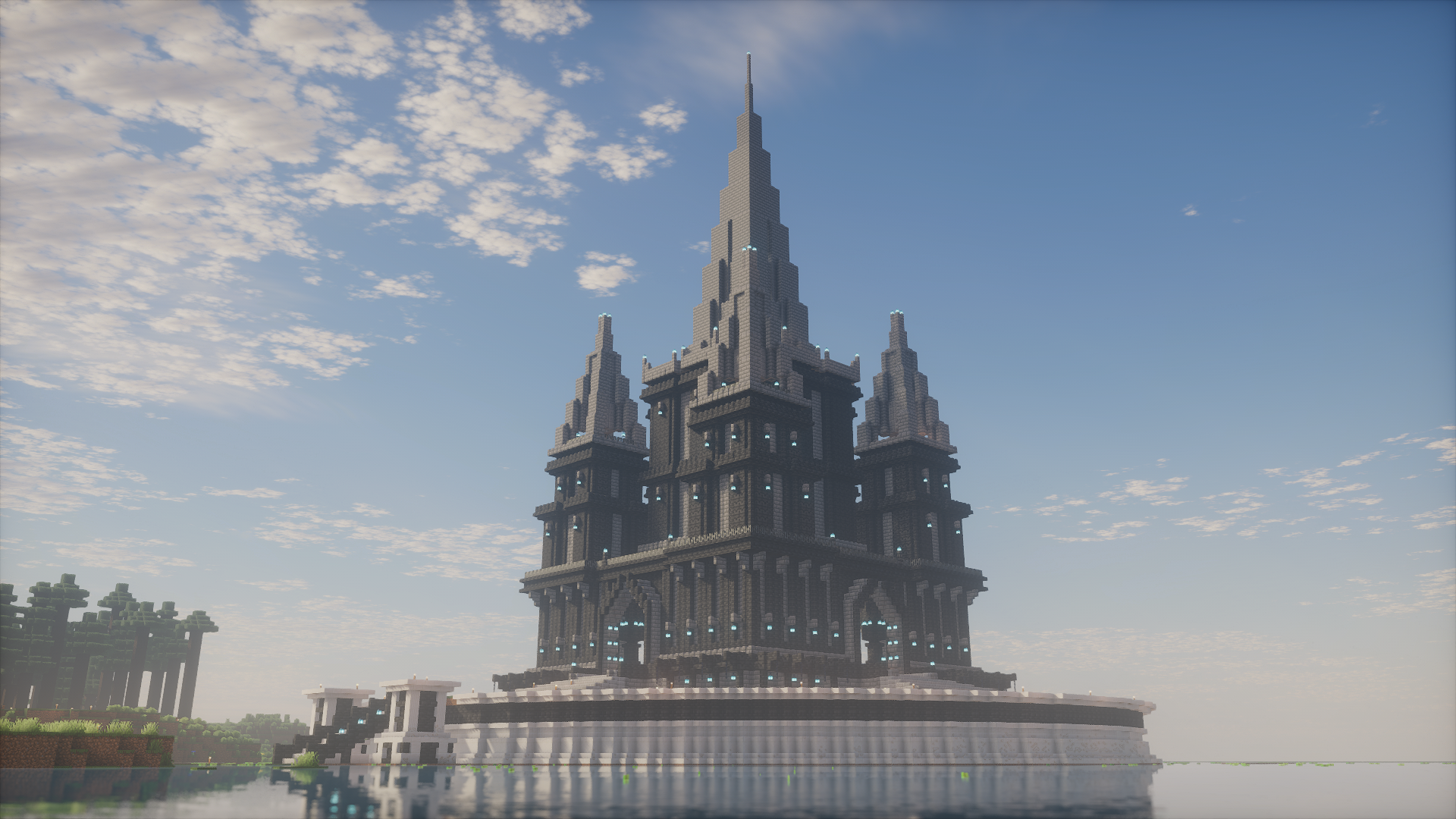 A monumental dark stone citadel reflected in the water